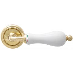 Дверная ручка Extreza Dana (Дана) 305 R01 полированная латунь F01